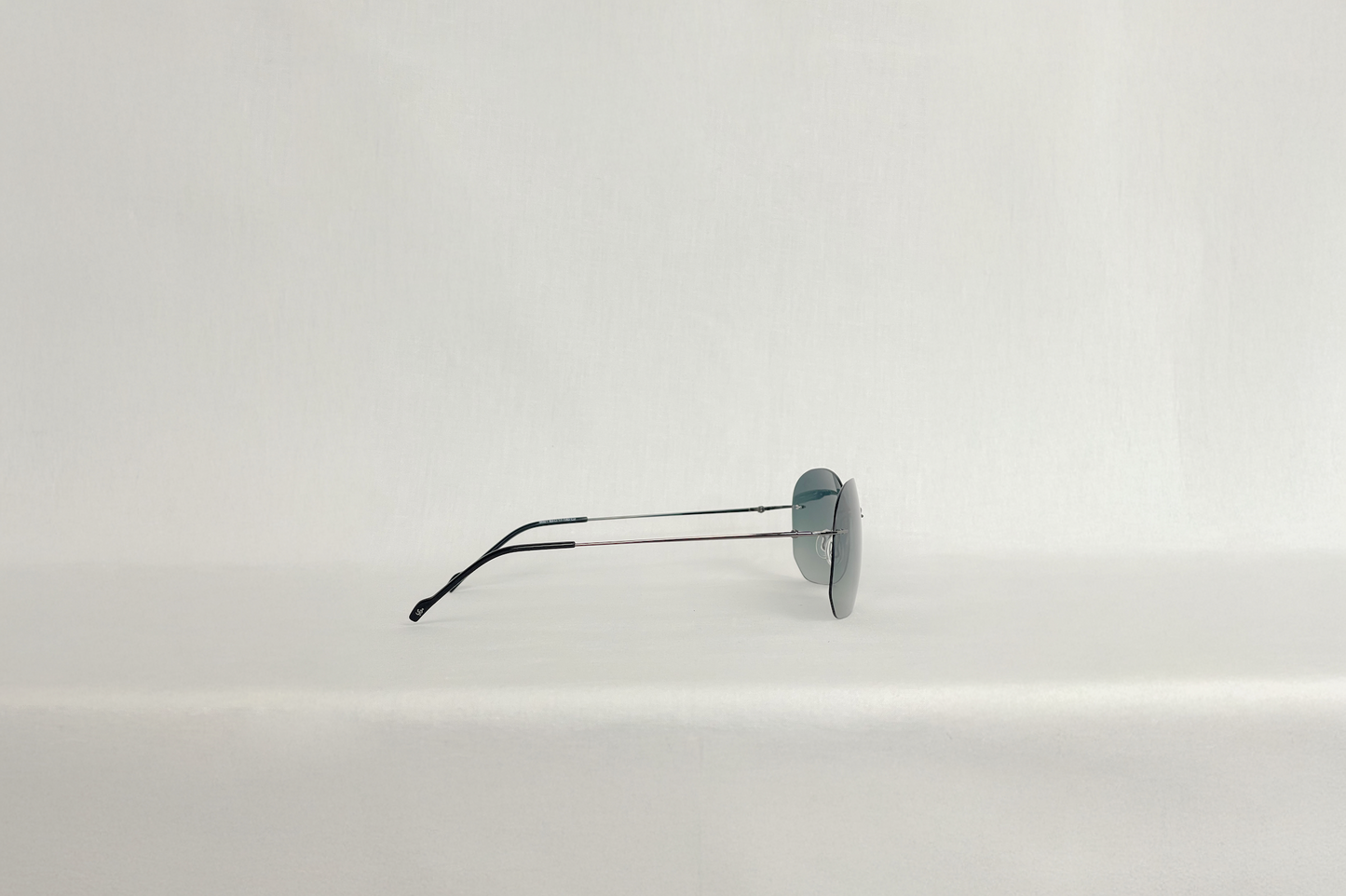 Moy Frameless Green Sunglasses